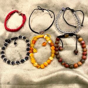 Lot of 6 Pull String Adjustable Bracelets. One is 4 Oceans, and one Pura Vida.